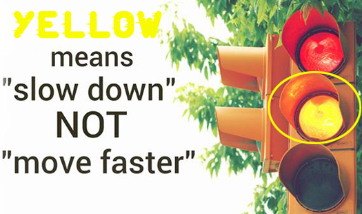 Yellow means slow down not move faster